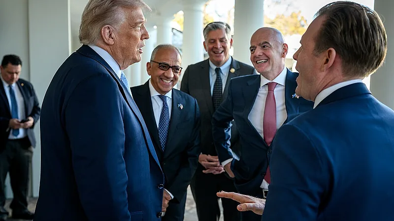 P20251117DT-0996 President Donald Trump speaks with members of the White House Task Force on the 2026 FIFA World Cup