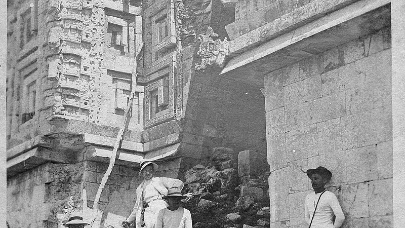 Four people by the Governors Palace, Uxmal Yucatan, 1913