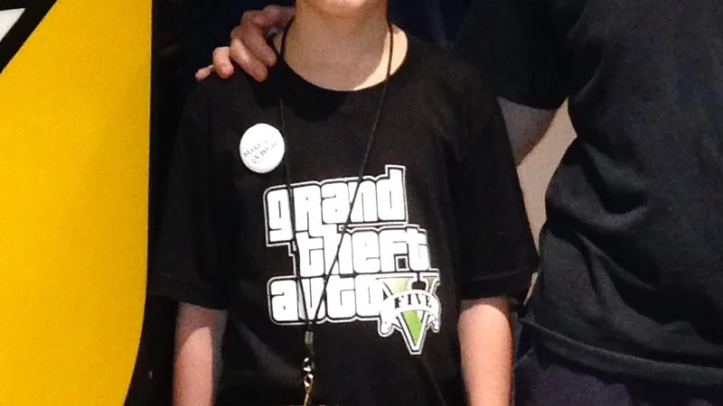 Boy wearing a Grand Theft Auto V T-shirt