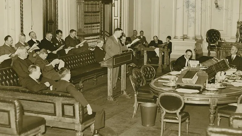 StateLibQld 1 250876 Frank Cooper presenting his budget speech to parliament, Brisbane, ca. 1940