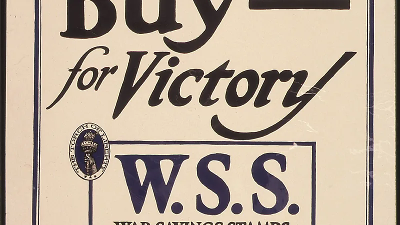 "Save- Buy- for Victory. W.S.S. War Saving Stamps issued by the United States Government for sale here."