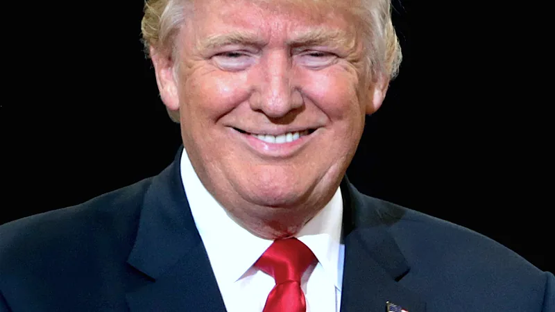 Donald Trump speaking with supporters at a campaign rally at the Phoenix Convention Center
